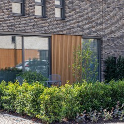 Tuin in stijl met de woning Tuin in stijl met de woning